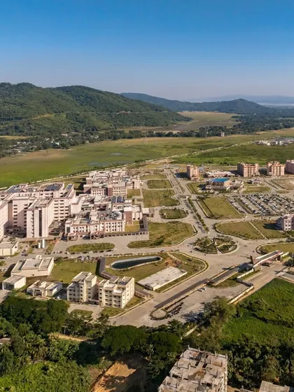 This aerial view of AIIMS Guwahati shows the campus's harmony with its natural surroundings. The climate-responsive design enhances occupant well-being and thermal comfort, making it a model for sustainable public healthcare infrastructure.
