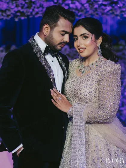 An intimate portrait amidst the grandeur. Even in a large-scale event, we find moments for the couple to connect, creating a beautiful contrast between the epic and the personal.