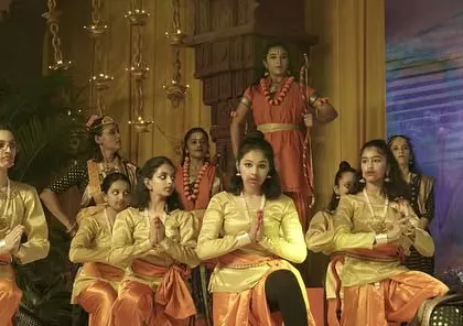 A group of performers in our 'Ramayan' production, set against a backdrop of traditional Indian temple decor.