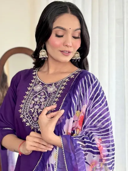 A beautiful violet chanderi viscose kurta set. The thread embroidery and printed dupatta create a look that's both regal and feminine.