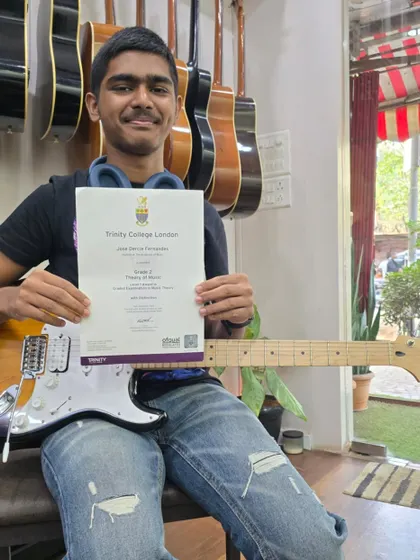 We're celebrating our star student, Jose Fernandes, who is currently preparing for his Grade 3 Rock & Pop Guitar exam. He aced his Grade 2 Theory of Music exam with an amazing score of 97%, showing his deep commitment to all aspects of musicianship.