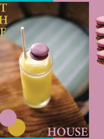 A creative graphic showcasing our House cocktail, complete with a macaron garnish. This image reflects the fun and whimsical side of our bar program, where presentation is just as important as taste.