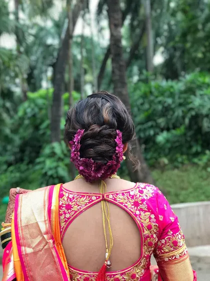 The full back view of this gorgeous Maharashtrian bridal bun, a true work of art.