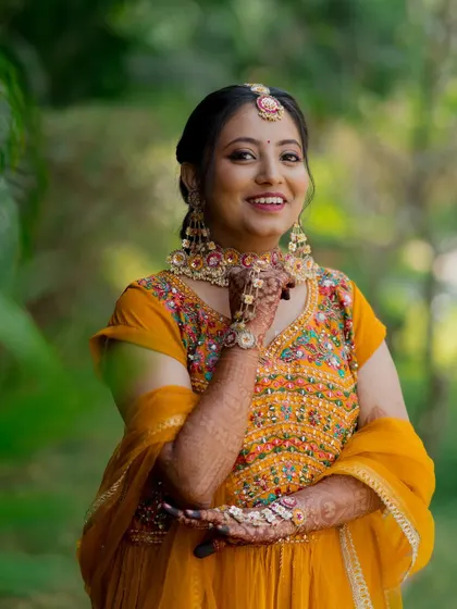 A bride's radiant smile during her Haldi ceremony. We love capturing these moments of pure happiness and anticipation.