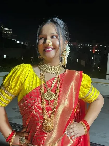 Another joyful shot of this classic red saree look. My goal is always to make my clients feel happy and confident in their attire.