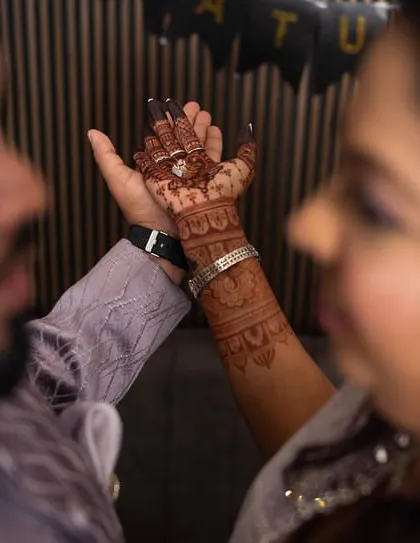 Another beautiful shot of the engagement ring against the dark mehendi stain.
