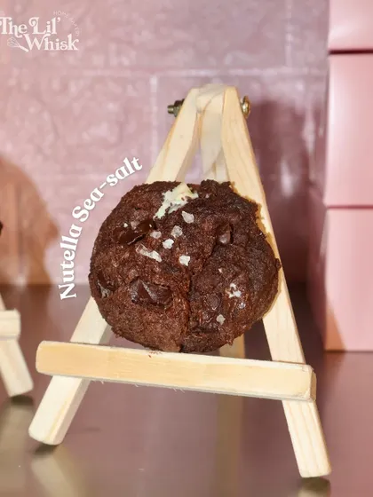 Our Nutella Sea-salt cookie is the perfect balance of sweet and salty, with a gooey Nutella center and a sprinkle of sea salt on top.