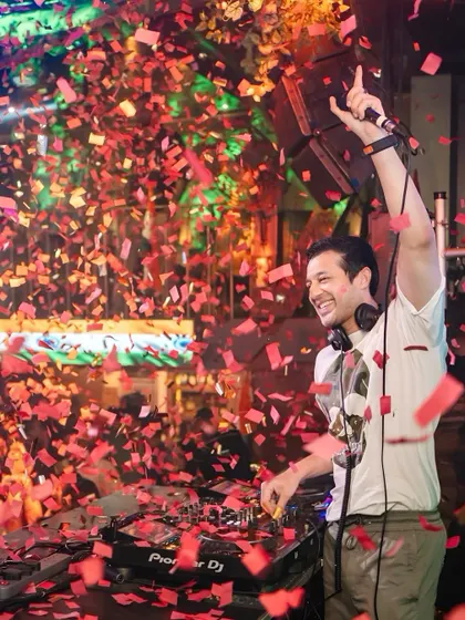 Nothing beats the feeling of a packed club, confetti in the air, and the entire crowd singing along. This shot from a 'Thursday Night Madness' event at Happy Brew captures the peak energy I bring to my club and pub gigs.
