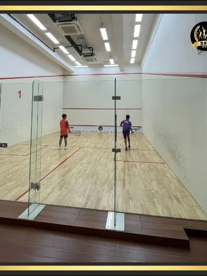 A clear view of one of our professional-grade, glass-backed squash courts. These are built to international standards, perfect for both intense competition and a friendly practice session.