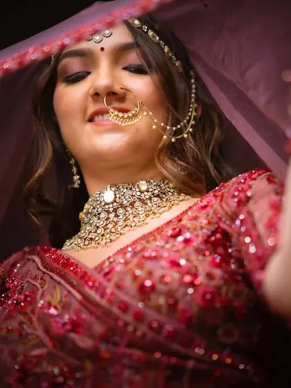 Another stunning close-up. Jenisha's makeup is soft and pretty, with a focus on her eyes and a natural, dewy finish.