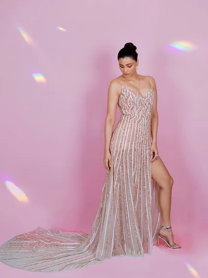 Actress Daisy Shah in a beautiful beaded gown against a soft pink backdrop. I added a subtle prism light effect to create a dreamy, ethereal look for this Filmfare event shoot.