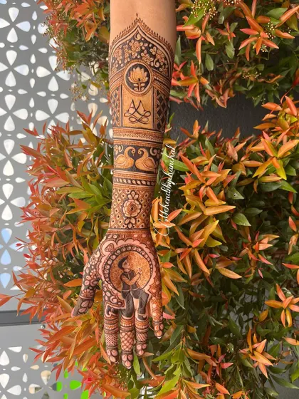 Another angle of the bride's portrait mehendi, captured in natural light to show the details against the beautiful background.