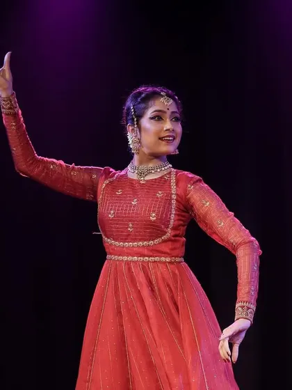 A solo portrait of my sister Spurthi during our duet performance. Her graceful hand gesture and serene expression capture the essence of Kathak.