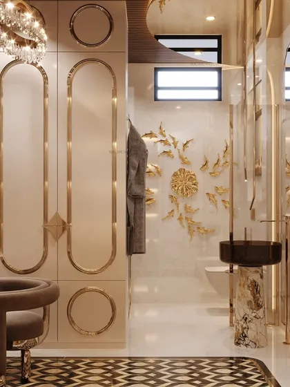 This combined bathroom and dressing area is the epitome of luxury. The design includes floor-to-ceiling wardrobes with gold trim, a dedicated vanity space, and artistic gold wall decor.