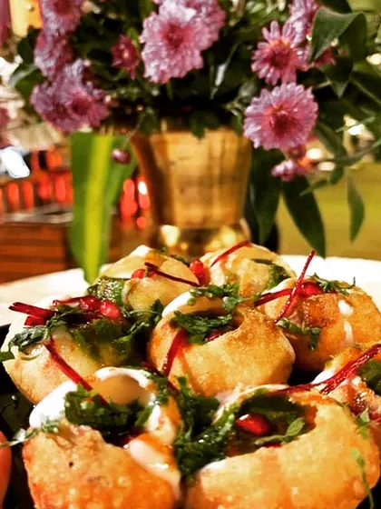 Soft lentil dumplings soaked in creamy yogurt, drizzled with chutneys, and garnished with pomegranate seeds. Our Dahi Bhalla is a refreshing and classic choice.