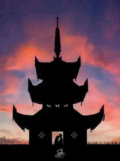 We love getting creative to tell your love story. This dramatic sunset silhouette from a pre-wedding shoot turns a simple kiss into a piece of art, showcasing our passion for unique and memorable couple portraits.