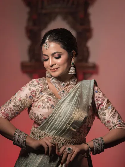 This series of images and video shows the versatility of one of my popular AD rental sets. The layered necklace, matching earrings, maang tikka, and vaddanam create a complete, glamorous look that catches the light from every angle.