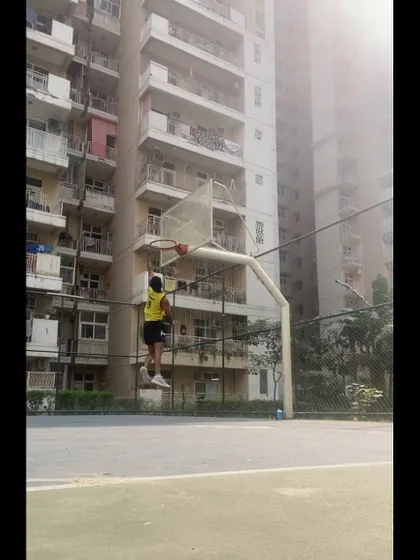 A young player executing a layup with good form. Seeing them apply what they learn in drills is the goal of my coaching.