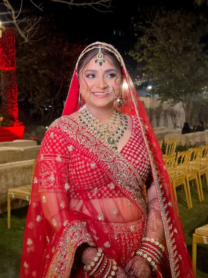 A happy, candid shot that captures her personality. The makeup looks fresh and vibrant, even in the evening lights.