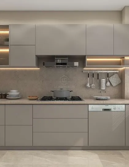 The kitchen from our 'Nivasa' project, designed for simplicity and longevity. The neutral grey cabinets, simple hardware, and clean lines create a timeless and highly functional workspace.