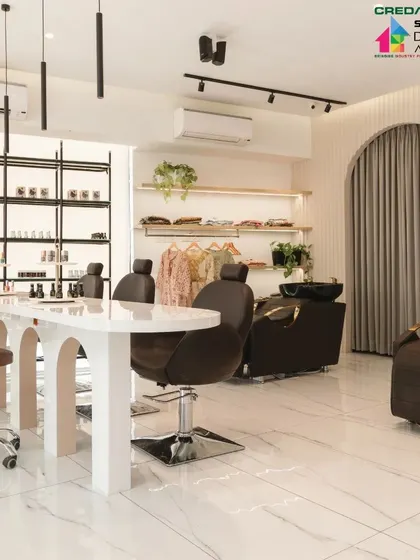 In the 'Frumos' luxury salon, we used arches and clean lines to create a serene and upscale environment. This view shows the manicure station, custom-designed with arched legs to echo the architectural elements, creating a cohesive and tranquil space for clients to relax and unwind.