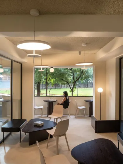 The outdoor seating area, because no hospitality space in Bengaluru is complete without one. It offers a quiet place to enjoy a coffee while looking out onto a surprisingly green view.