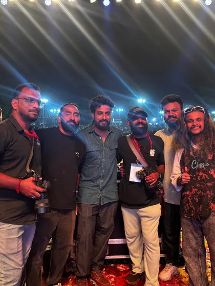 A group photo with my performance crew and the event photographers. It takes a village to put on a great show.