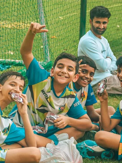 A moment of post-game relaxation and bonding for players and their families.