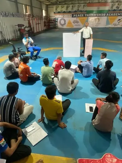 Another angle of our workshop, showing the engaged group of athletes learning together. This is part of our commitment to training for excellence in every aspect.