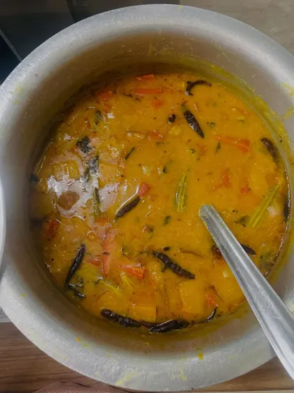 A hearty bowl of our homemade Sambhar, packed with vegetables and cooked with a special blend of spices. The perfect accompaniment for idli and rice.