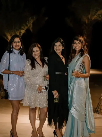 Guests enjoying the cocktail hour at an outdoor event. Our planning ensures that every part of the celebration, from the decor to the drinks, contributes to a memorable experience.