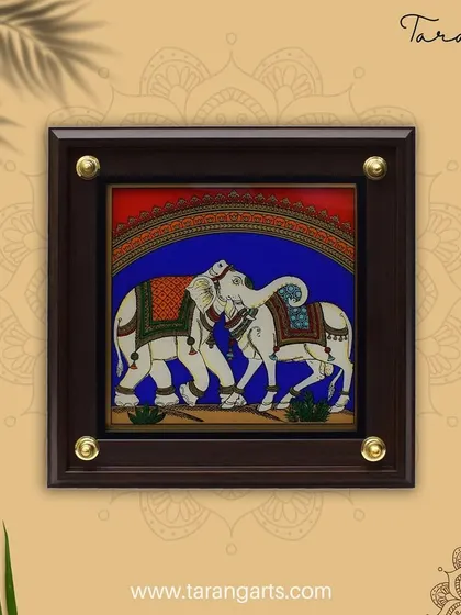 A unique glass painting featuring both an elephant and a cow. This artwork combines symbols of strength and abundance, making it a powerful and beautiful piece for your home, handcrafted with traditional techniques.