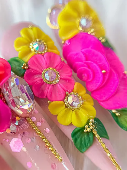 Another close-up, this time focusing on the layered 3D daisies and the delicate gold beadwork that adds a touch of elegance.