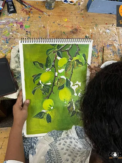 The finished monochrome painting of apples on a branch. The student has successfully used various tones of green to create a sense of light, shadow, and volume.