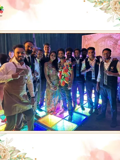 Our team posing on a colorful LED dance floor. We are more than just bartenders; we are a part of the celebration.