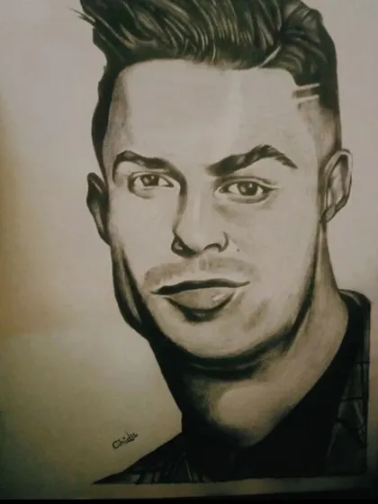 Another pencil portrait of the football icon, CR7. This drawing focuses on a different expression and hairstyle, showcasing my ability to capture various looks of the same person.