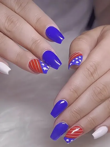 A patriotic theme with red, white, and blue nails featuring stars and stripes, perfect for special holidays or events.