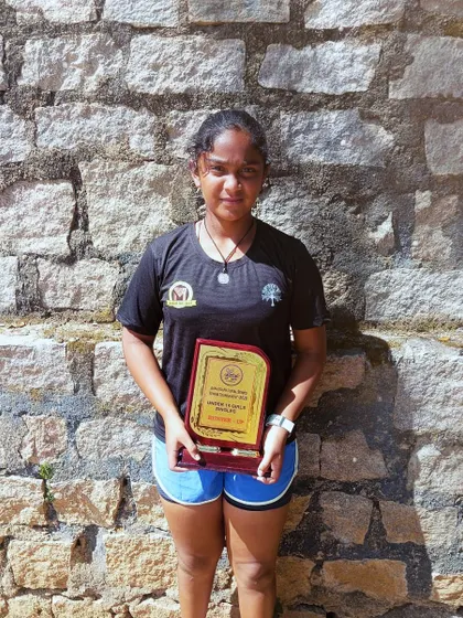 Eshita with her finalist plaque from the NS U-14 Hyderabad tournament. Every final is a valuable learning experience.
