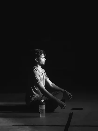 In the quiet of the gym, a fighter finds his center. This mental discipline is as crucial as any physical skill we teach.