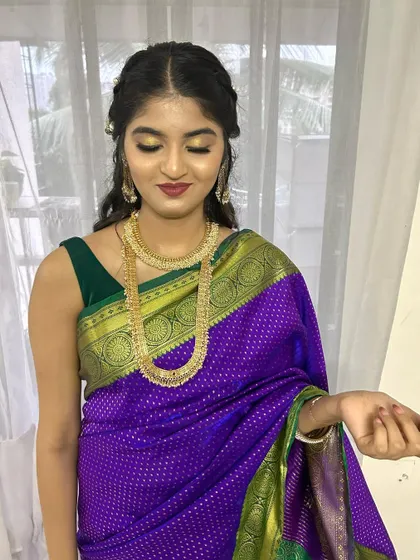Another shot showing the beautiful details of her makeup and jewelry.