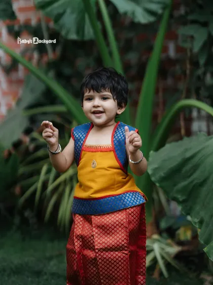 Sweetness overloaded in this vibrant, traditional South Indian outfit.