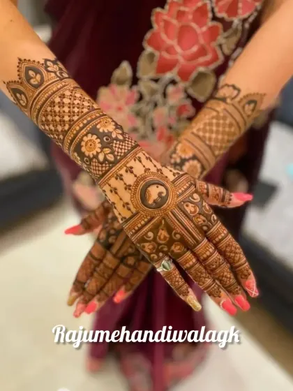 This design shows our versatility, combining different styles in one. It has a central peacock mandala, floral bands, and geometric patterns, all coming together to create a balanced and full bridal look.