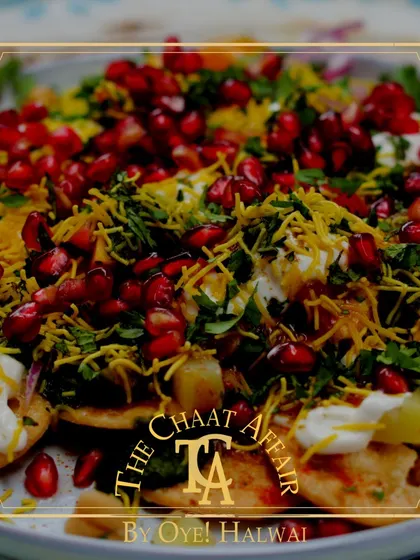 A vibrant plate of our Papdi Chaat, generously topped with fresh pomegranate seeds, sev, and our signature chutneys. We believe in using the freshest ingredients to create a perfect symphony of sweet, spicy, and tangy flavors in every bite.