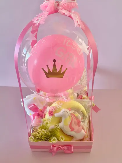 Another angle of the "It's a Girl" balloon hamper, showing the "It's a Girl" text on the balloon.