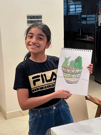 A beautifully detailed drawing of a potted cactus. This project helped the kids practice their line work, shading, and use of color.