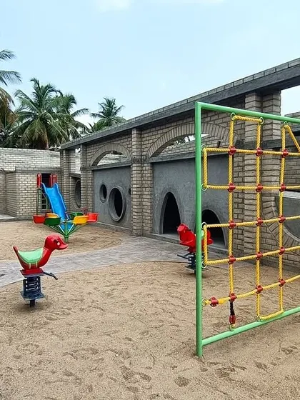 Another view of the playground at Sai Kirupa, showing various types of play equipment designed to aid in the children's physical and sensory development.
