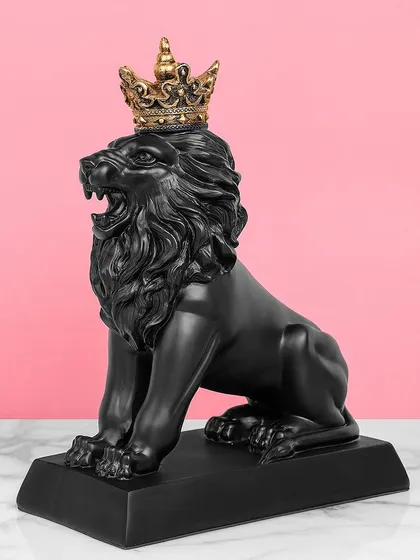 This roaring black lion with a golden crown is a powerful and regal showpiece. The contrast between the matte black and the shiny gold creates a dramatic and luxurious look.