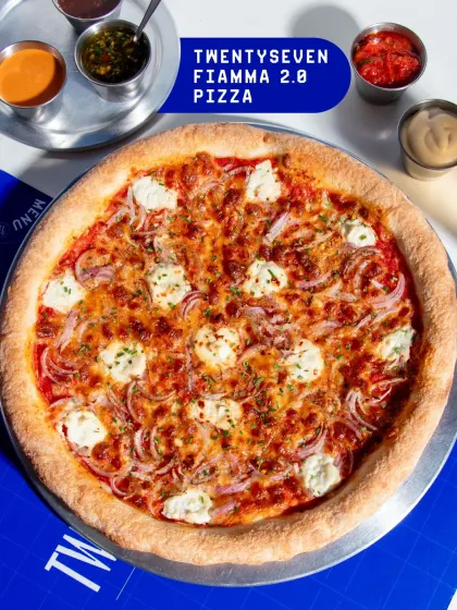 This is my TwentySeven Fiamma 2.0. It's a spicy and flavourful pizza with pomodoro, aged mozzarella, red onion, spring onion ricotta, and a kick of pickled green chilli and red chilli flakes.