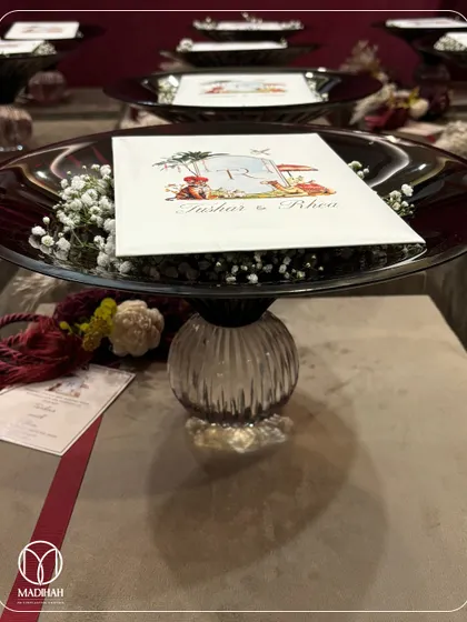 My Crimson Crystal Bowls, used here as a base for a beautiful Roka announcement. The deep red hue of the crystal, combined with baby's breath, creates a rich and celebratory presentation.