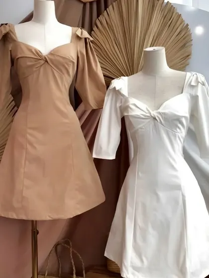 A classic A-line dress is always in style. I designed these custom mini dresses with feminine puff sleeves and a sweetheart neckline, tailored for a flattering fit. I can create these made-to-measure dresses in a variety of fabrics and colors to match your personal style.